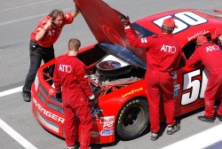 Pit Crew diagnose problems on Joey McColm's car following the race.